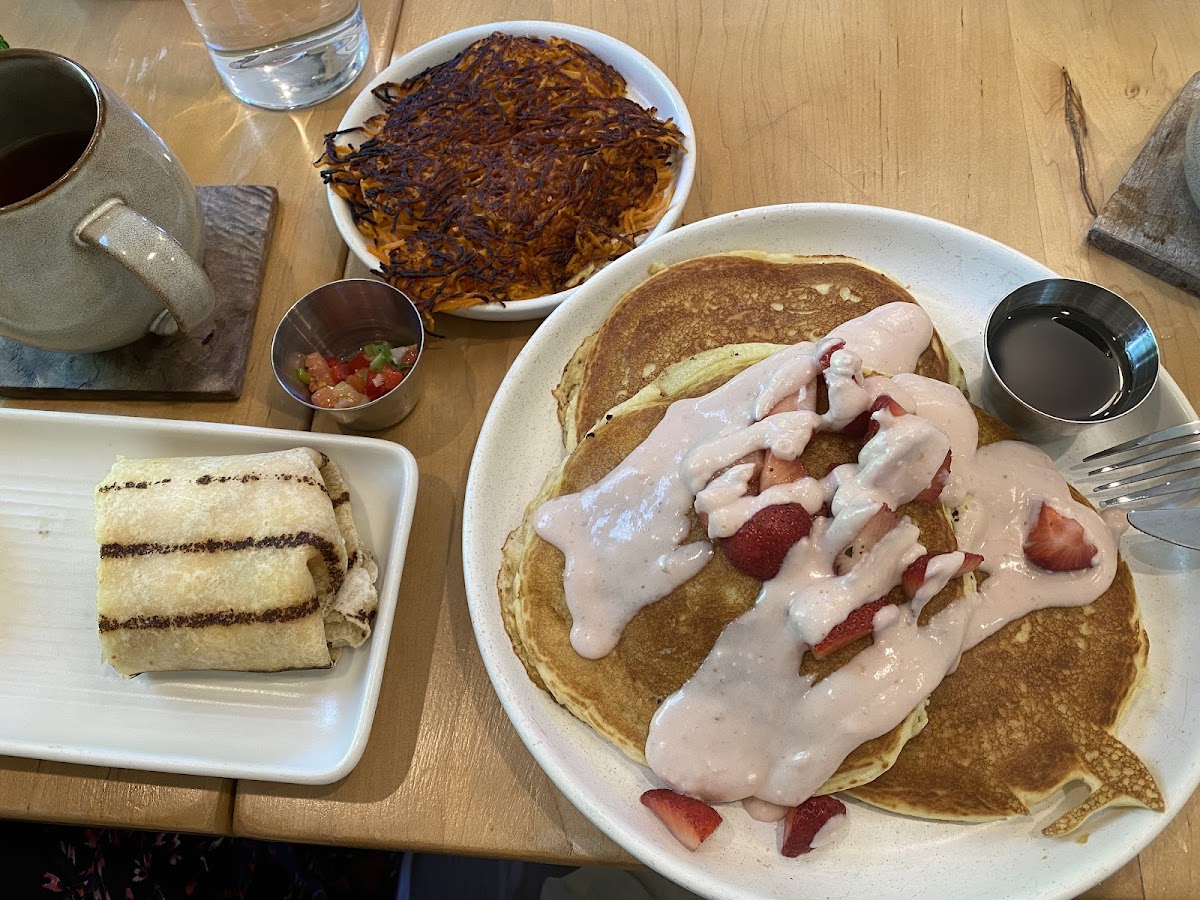 Breakfast burrito and specialty strawberry pancakes