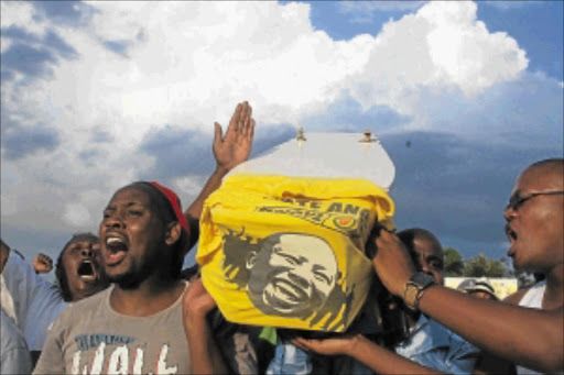 JUBILATION: The anti-Malema faction in Seshego, Limpopo, celebrates his political 'death' at the weekend. PHOTO: CHESTER MAKANA