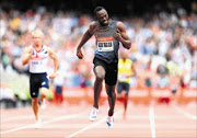 TRIUMPHANT:  Usain Bolt of Jamaica crosses the line to win the Men's 4 x 100m relay during day two of the Sainsbury's Anniversary Games, IAAF Diamond League 2013, at The Queen Elizabeth Olympic Park, last week in London.   PHOTO: getty images