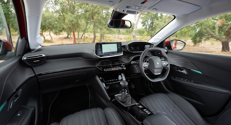 The 208 interior has fine materials and playful graphics. P