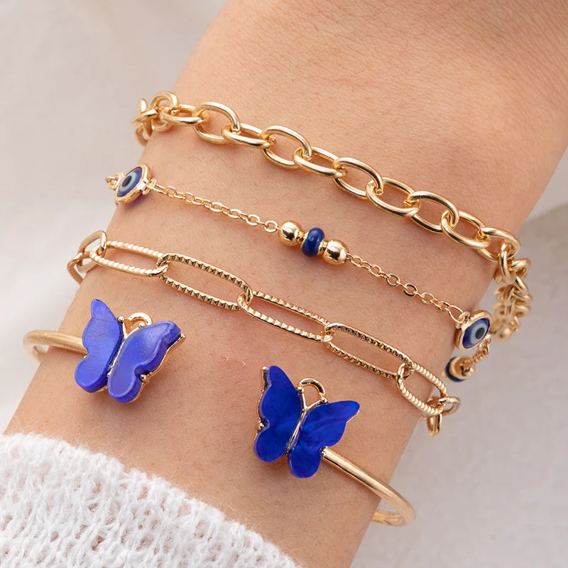 Blauwe vlinder diamanten holle vierlaagse armband, een elegant sieraad dat elke outfit verfraait en je pols laat stralen.