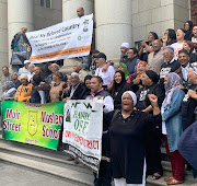 District Six claimants demonstrate outside the high court in Cape Town on May 17 2019.