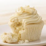 White Chocolate Cupcakes with Truffle Filling was pinched from <a href="http://www.pamperedchef.com/recipe_search/recipe.jsp?id=100348" target="_blank">www.pamperedchef.com.</a>