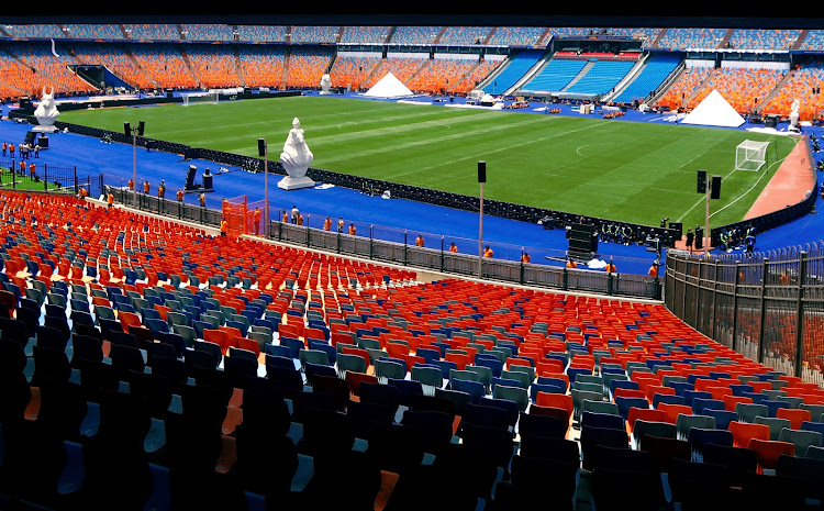 A general view of Cairo International Stadium as employees and security complete their work ahead of the Africa Cup of Nations opening soccer match between Egypt and Zimbabwe in Cairo, Egypt June 19, 2019.