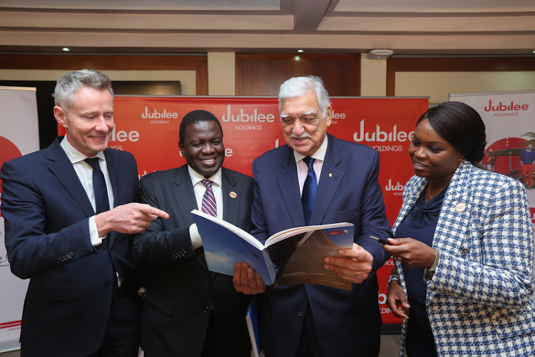 Jubilee Holdings Ltd Group COO Juan Cazcarra with Group CEO Julius Kipngetich; Group Chairman Nizar Juma and Group Company secretary Margaret Kipchumba during the 2022 Annual General Meeting.