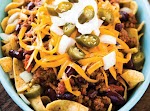 Frito Pie with Chili con Carne was pinched from <a href="http://www.parade.com/67030/smccook/game-day-frito-pie-with-slow-cooker-chili-con-carne/" target="_blank">www.parade.com.</a>