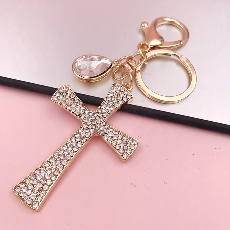 Chaveiro Cruz Diamante Gota D'água Cristão, Pingente Metal, Acessório Bolsa Feminina em Oferta! Um toque de fé e estilo.