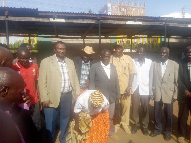 Some of the Fera torture victims outside Bungoma law courts