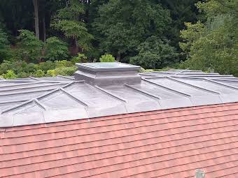 Full new roof including lead roof album cover