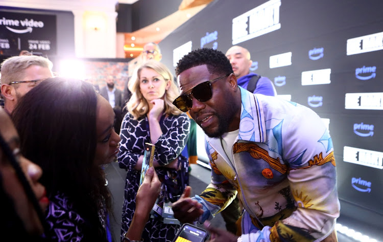 American comedian and actor Kevin Hart talks to reporters on the black carpet during his movie premiere Die Hart at Montecasino. Picture: Masi Losi