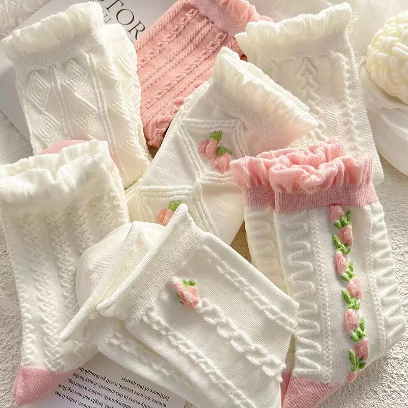 Women's Japanese Style Mid Tube Lace Socks offer a touch of elegance and comfort. Perfect for everyday wear, these socks
