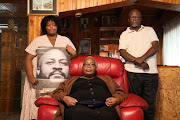 The family of Shonisani Lethole who died at Tembisa Tertiary Hospital on June 29 2020. His sister Dakalo, left,  mother Patricia and father Albert Lethole. The South African Medical Assocation said the findings by the health ombud on Lethole's death must lead to meaningful change in SA health care.