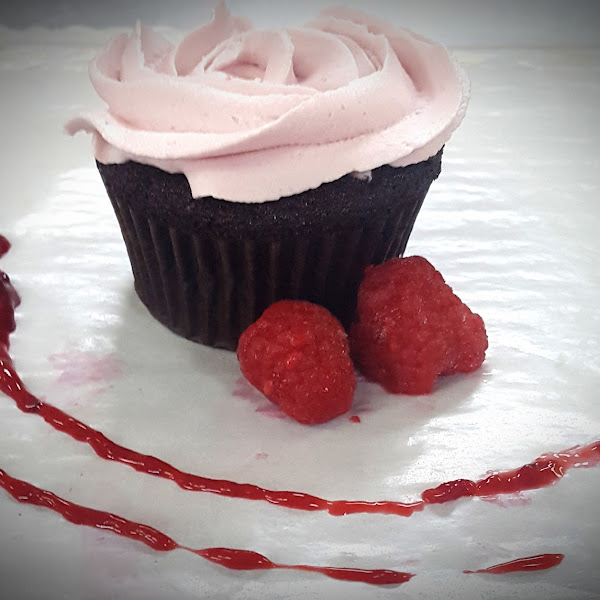 Raspberry Filled Chocolate Cupcake with organic frosting. Gluten, dairy, soy and GMO Free