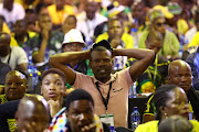 Delegates react to the announcement of the top seven at the 55th ANC national elective conference at Nasrec Expo Centre in Johannesburg on December 19 2022.