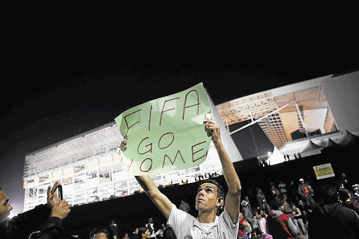 HOME TALK: Brazil's Homeless Workers' Movement block a road during a protest in front of Sao Paulo's World Cup stadium. File photo.