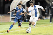 GIVEN A SCARE: Sameegh Doutie of SuperSport and David Zulu of Chippa United during their Absa Premiership match  at Lucas   Moripe Stadium on Tuesday. SuperSport won the match 1-0 Photo: Lefty Shivambu/Gallo Images