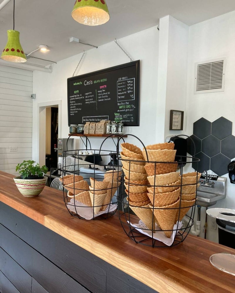 Counter at the Durham location. Regular waffle cones in the foreground, labeled GF cones (which are made on unwashed shared equipment) behind