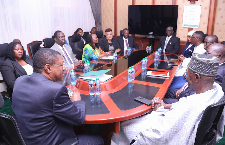 Moses Wetang'ula with National Assembly Authority of the Gambia Republic at Parliament Buildings.