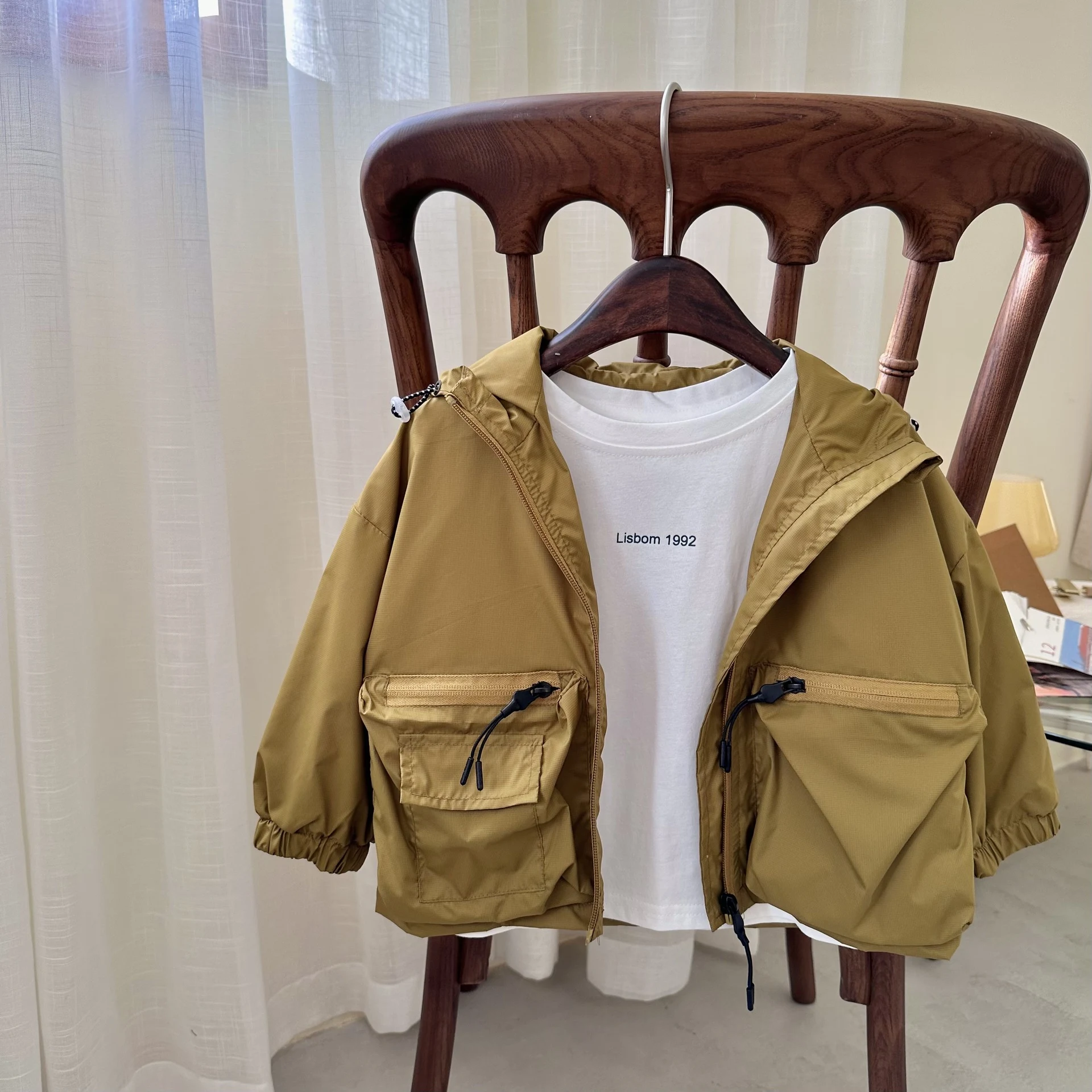 Title 3, Boys solid color short hood shell jacket, a li...