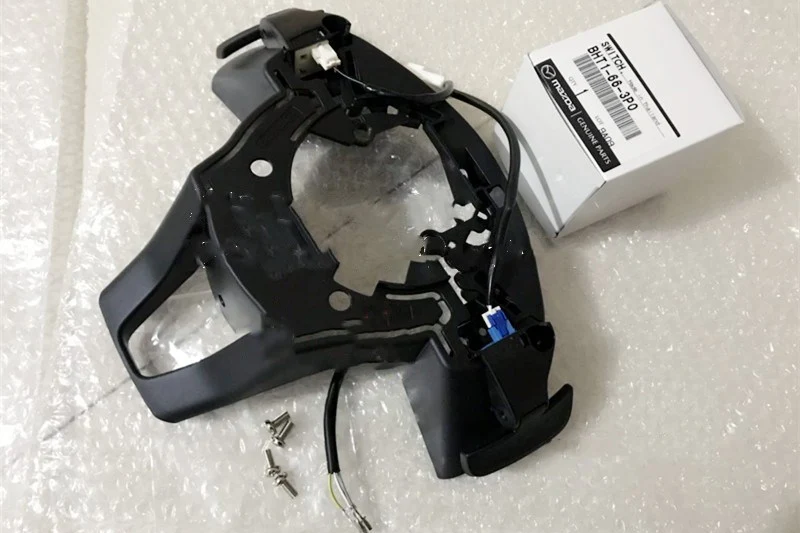 Paddle Shifter Mazda Angkesaila e Atez Aprimoram a Troca de Marchas no Volante, Proporcionando uma Condução Mais Esportiva e Maior Controle.