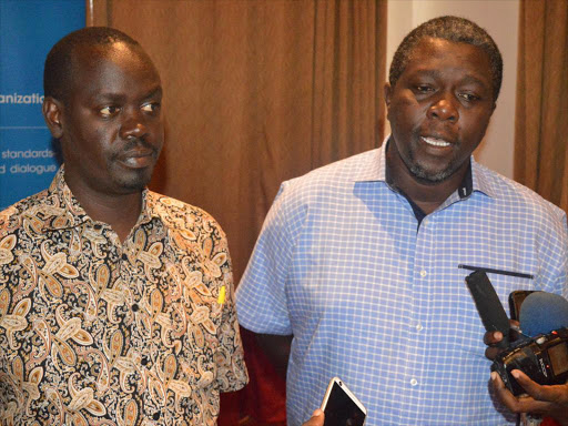 Peter Kiptoo and Dennis Otieno of the Pharmacy and Poisons Board during a press conference in Mombasa, June 7, 2017. /JOHN CHESOLI