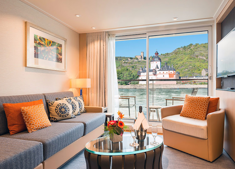 Relax in the comfy living quarters of a Veranda Suite on your Viking Longship.