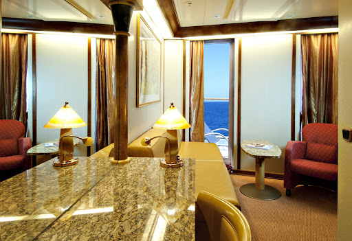 Book a Vista Suite on Carnival Vista, which features a private balcony and lounges.