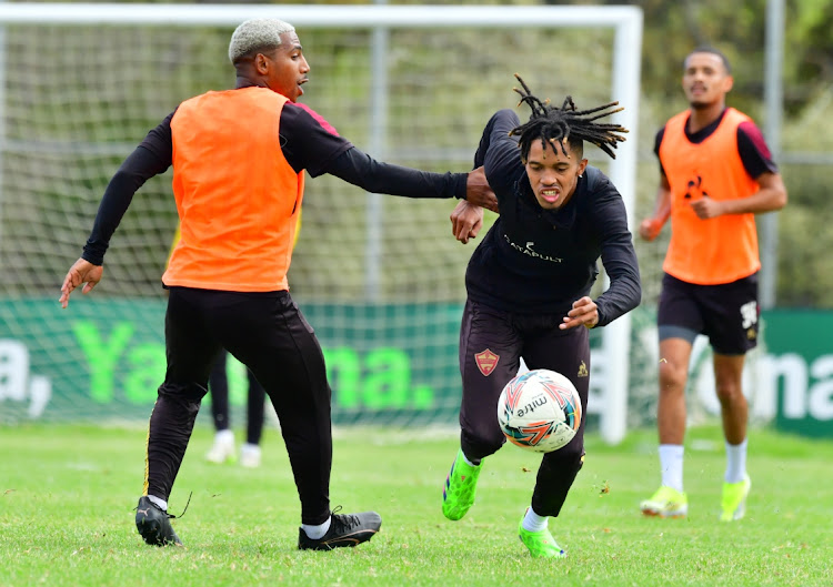 Deano van Rooyen and Antonio van Wyk emjoy Stellenbosch training at Lentelus Sports Ground yesterday in Stellenbosch yesterday ahead of the weekend Cup clash against SuperSport.