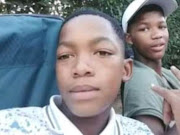 Liam Siegel,14, who was killed during a service delivery protest in Mangaung, with a friend. 