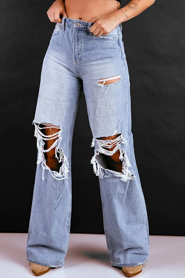 Pantalones rectos de cintura alta, sueltos y lavados, perfectos para un look cómodo y moderno. Disfruta de libertad y estilo.