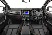 Leather has been used to trim the dashboard upper, steering wheel and gear lever. Seats get contrasting red stitching.