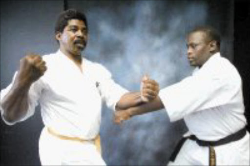 MASTERS: Sempai Dingha Stanislas and Shihan Collen Sedoaba at sowetan offices. Pic. Mohau Mofokeng.