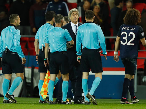 Football Soccer - Paris St Germain v Manchester City - UEFA Champions League Quarter Final First Leg - Parc des Princes, Paris, France - 6/4/16 Manchester City manager Manuel Pellegrini with referee Milorad Mazic at the end of the match Action Images via Reuters / John Sibley Livepic