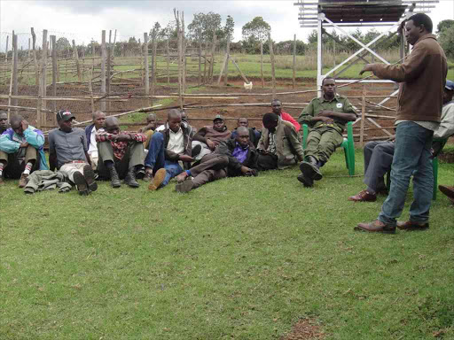 John Lengoisa, programme officer for the Ogiek People's Development Programme, addresses fire scouts near Logoman, May 17, 2017. /REUTERS