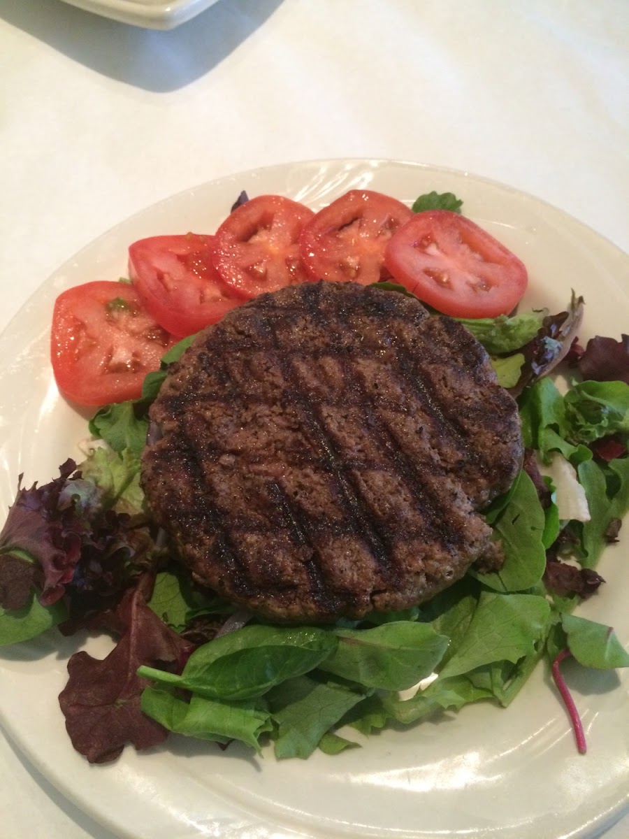 Look at those perfect grill marks! A delicious and juicy burger made from a blend of filet mignon and ribeye. YUM!