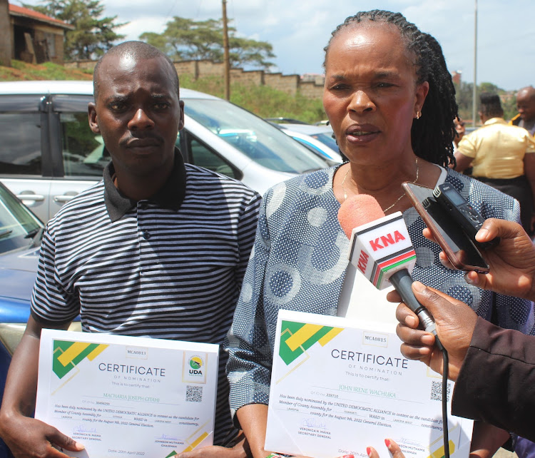 Joseph Gitahi of Githiga ward and Irene Wachuka of Igwamiti ward, both in Laikipia county, after receiving their nomination certificates in Nyeri Wednesday