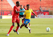 Themba Zwane of Mamelodi Sundowns challenges for possession in the Caf Champions League Group A match against Al Merrikh at Al Salam Stadium in Cairo, Egypt on February 19 2022.