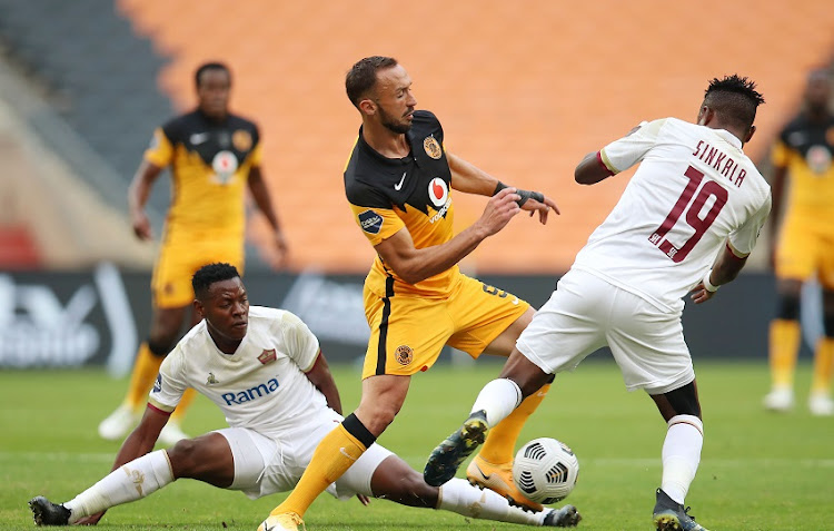 Samir Nurkovic of Kaizer Chiefs is challenged by Nathan Sinkala and Alton Zitha Macheke of Stellenbosch FC during their DStv Premiership match at FNB Stadium on Tuesday.