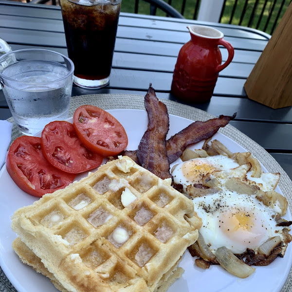 Gluten free waffles, bacon, carmelized onion and egg smash, and heirloom tomatoes