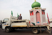 A truck carries a chariot during the Ashura procession in Durban on July 29 2023. 