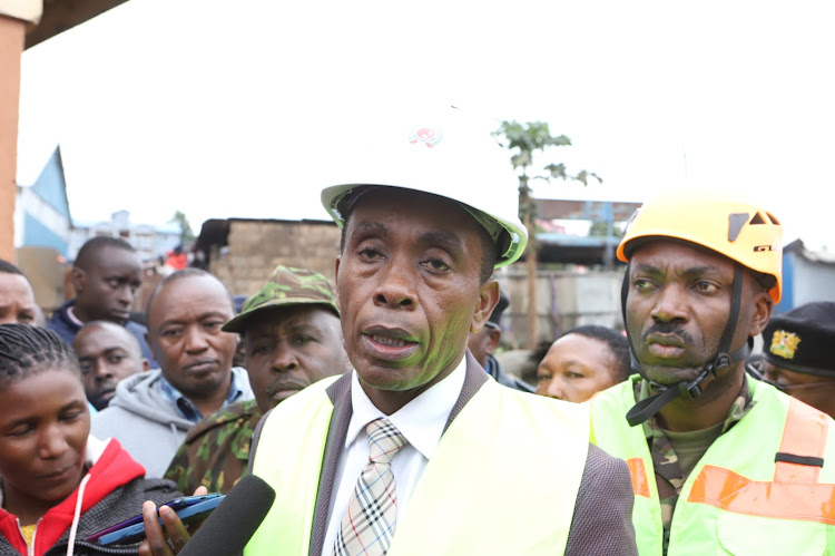 Kiambu governor Kimani Wamatangi speaks to press at the scene of building collapse at Ruaka area in Nairobi on November 16, 2022/ANDREW KASUKU