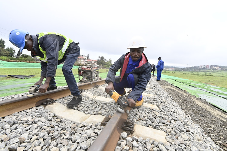 Construction workers at the Riruta-Ngong Commuter Rail line in Ngong, Kajiado County on December 15, 2023