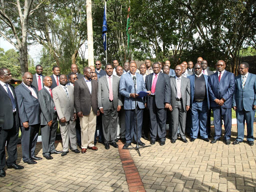 President Uhuru Kenyatta, Deputy President William Ruto and the Governors of Kenya make a resolution after their two day Summit at Sagana State Lodge Nyeri.Photo/PSCU