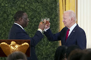 US President Joe Biden, right, toasts with Senegal's president Macky Sall during the US-Africa Leaders' Summit dinner in Washington DC, US, attended by African leaders from 49 countries and the African Union.