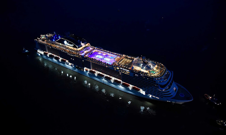     The megaship MSC Grandiosa from MSC Cruises pictured at night. 