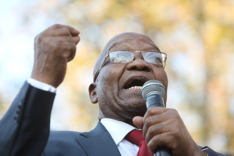 Former president Jacob Zuma addresses supporters outside the Pietermaritzburg High Court on Monday.