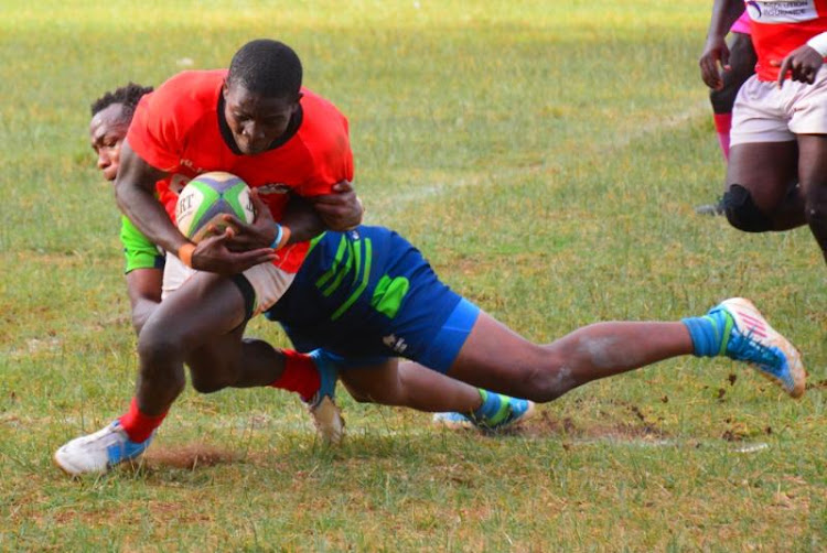 Impala's Qunto Ongo is tac kled by Peter KIlonzo of KCB in a past match