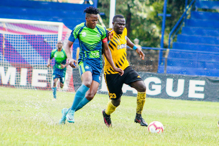 Sofapaka's Ronald Okoth(R) challenges KCB's Michael Kibwage in a past match