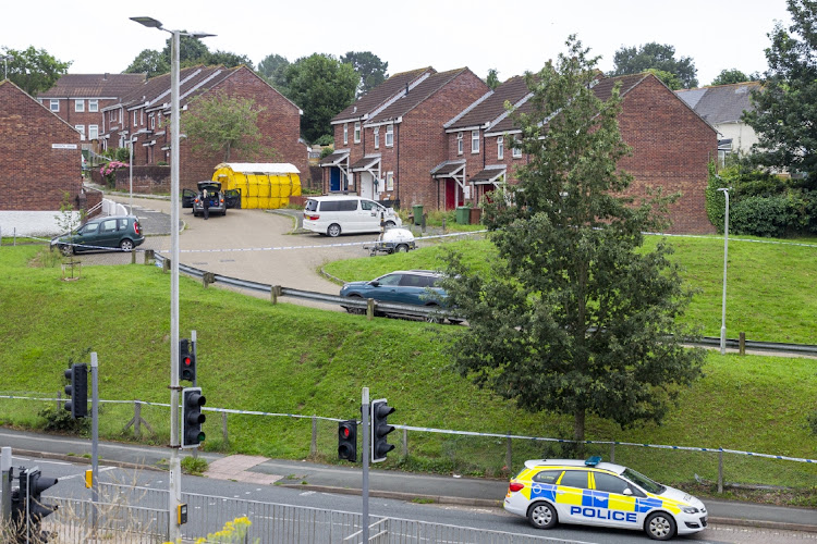 A police car sits at the the scene on Biddick Drive following a shooting in Keyham yesterday evening on August 13, 2021 in Plymouth, England.