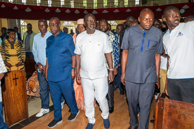 Siaya Senator Oburu Odinga and his brother Azimio la Umoja party leader Raila Odinga arrive at Ofafa Memorial Hall in Kisumu for Jaramogi Oginga Odinga's memorial service on January 20, 2024.